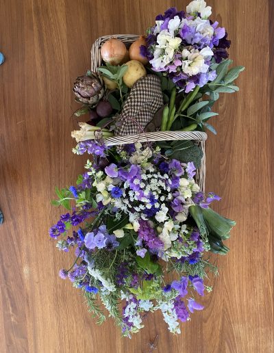 Eco basket of seasonal summer funeral flowers