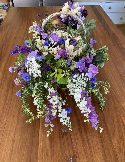 Basket of summer meadow funeral flowers, Ledbury